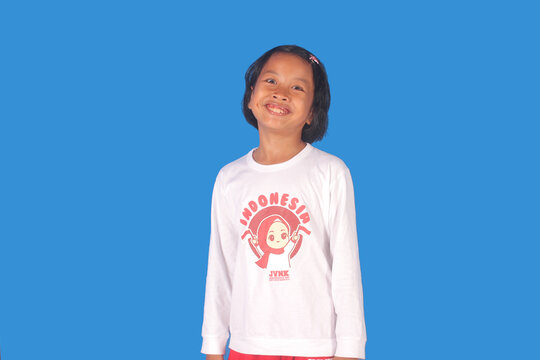 Asian girl wearing black clothes on a white background with a sweet smile expression with short hai
