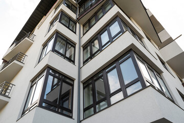 Part of a high-rise, modern architecture of a residential building