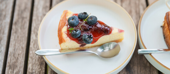 Closeup Blueberry Cheese Pie, Homemade Cheese Cake with fresh strawberries and Berries. Dessert,  Bakery and Pastry concept