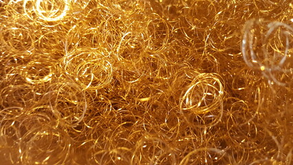  a pile of gold colored metal wire