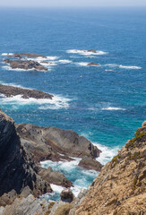 White stork nest place over cliff peak