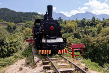 old steam train in the countryside in jablanica, above river neretva
