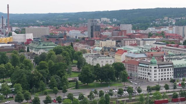Drone fly to Jonkoping city in Sweden. Government office old building and city park.
