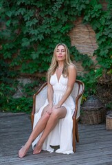 Woman in Greece dress, fashionable Bohemian chic. Beautiful blonde natural lady
