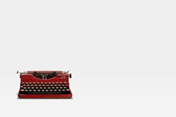 Vintage typewriter on white flat background