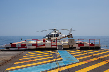 helicopter on landing pad in Monaco © emartme