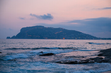Fototapeta na wymiar Beautiful eveining scene on Alanya beach in Turkey
