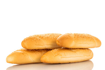 Four fragrant bagels, close-up, isolated on white.
