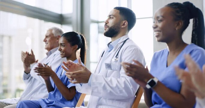 Excited, wow or doctors clapping for success, good job or results target in hospital meeting or workshop. Applause, presentation or group of happy nurses smiling for medical goals, news or support