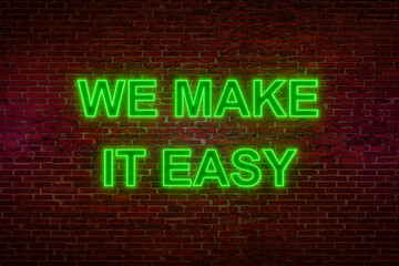 Obraz premium Brick wall at night with the text 