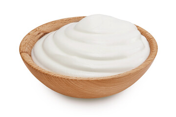 sour cream or yogurt in wooden bowl isolated on white background with full depth of field