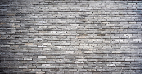 Fototapeta na wymiar Grey brick wall