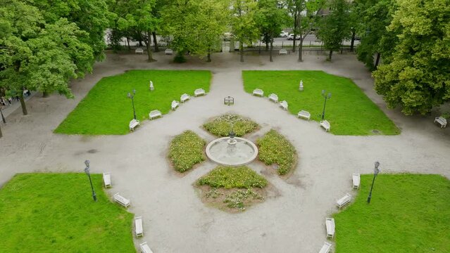 A drone shot of Henryk Sienkiewicz Park in Lodz. Aerial, Greenery, Nature, Tranquil, Peaceful, Urban escape, Outdoor, Green oasis, Fresh air, Nature's beauty, Relaxation, Beauty, Refreshing