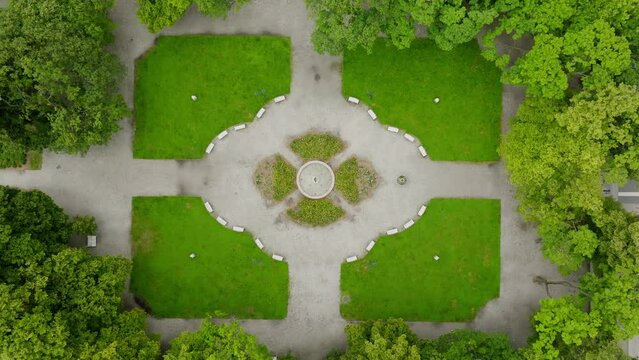 A drone shot of Henryk Sienkiewicz Park in Lodz. Aerial, Greenery, Nature, Tranquil, Peaceful, Urban escape, Outdoor, Green oasis, Fresh air, Nature's beauty, Relaxation, Beauty, Refreshing