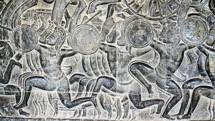 Wall carving of Khmer Culture in Ancient ruins Angkor Wat temple - famous Cambodian landmark. Siem Reap, Cambodia.