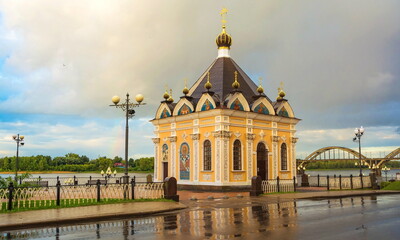 St. Nicholas Chapel during the rain on the Volga embankment in Rybinsk