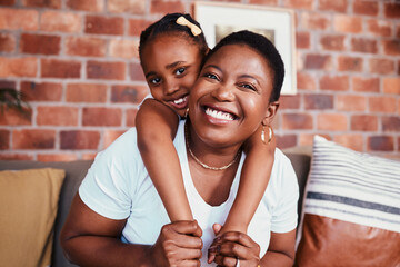 Portrait of mom and kid on sofa with hug, bonding and relax in living room together. Love, mother...