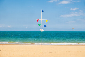 Great view of Chipiona beach in Cadiz province, blue sky, white sand, palm trees,  Spain, Europe