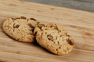Delicious Chocolate Chip Cookies on a wooden background