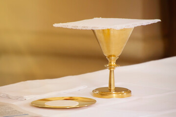 Consecration of bread and wafer wine