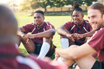 Sports, rugby and men on grass for rest at training, practice and exercise workout for match. Fitness, teamwork and male people relax for planning strategy for competition, challenge or game on field