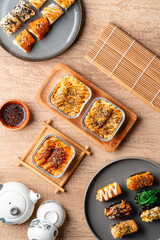 sushi is a Japanese dish of prepared vinegared rice, usually with some sugar and salt, accompanied by a variety of ingredients such as seafood, often raw and vegetables.