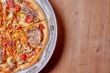 Home made, hot and organic Italian pizza on table. Mamma mia.