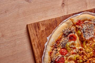 Home made, hot and organic Italian pizza on table. Mamma mia.