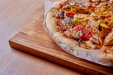 Home made, hot and organic Italian pizza on table. Mamma mia.