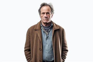 Fototapeta premium Group portrait photography of a man in his 50s with a pained and tired expression due to fibromyalgia wearing a chic cardigan against a white background 