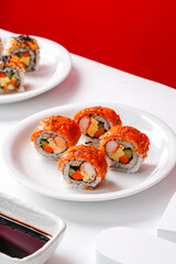 sushi is a Japanese dish of prepared vinegared rice, usually with some sugar and salt, accompanied by a variety of ingredients such as seafood, often raw and vegetables.