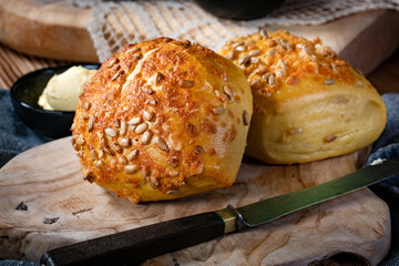 Tasty buns with cheese and sunflower seeds.