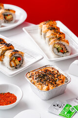 sushi is a Japanese dish of prepared vinegared rice, usually with some sugar and salt, accompanied by a variety of ingredients such as seafood, often raw and vegetables.