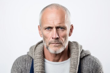 Obraz premium Medium shot portrait photography of a man in his 40s showing tiredness and a worn-down expression due to chronic fatigue syndrome wearing a chic cardigan against a white background 