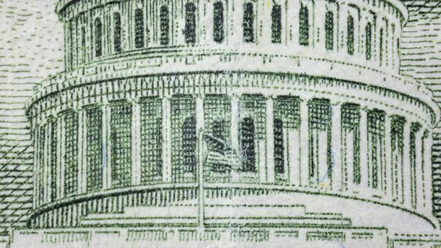 Close-up shot of various parts of a fifty dollar bill