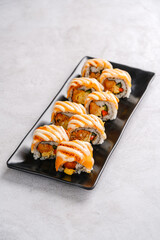 sushi is a Japanese dish of prepared vinegared rice, usually with some sugar and salt, accompanied by a variety of ingredients such as seafood, often raw and vegetables.