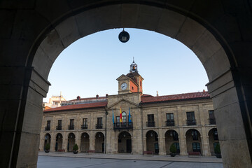 City Hall in the Spain square in the old town of the beautiful city of Aviles with its historic buildings with arcades, Asturias, Spain.