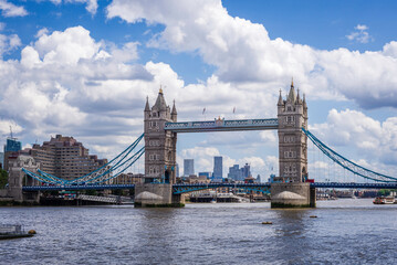 Fototapeta na wymiar Iconic Tower Bridge connecting London with Southwark on the Thames River UK beautiful English symbols Sunny day wallpaper travel