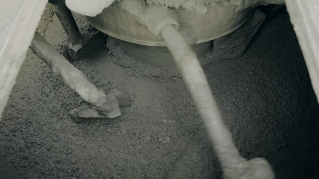 mixing concrete mixture in a large mixer 50fps Slow motion