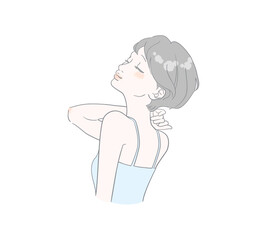 首に手を添えリラックスするショートヘアの女性