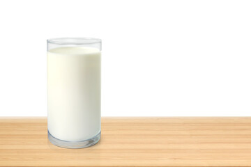 Glass of milk on wooden table isolated PNG transparent