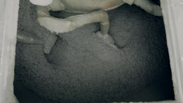 mixing concrete mixture in a large mixer 50fps Slow motion