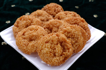 Anarsa which is an authentic sweet snack especially made in the festive season like Diwali in Maharashtra, it is also made in Marathi cultured adhik maas, selective focus.