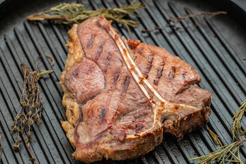 Beef steaks on the grill with flames. banner, menu, recipe place for text, top view