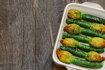 Oven baked stuffed zucchini flowers, Italian cuisine