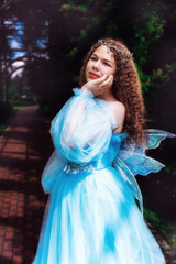 Fototapeta premium Fairytale with beautiful young girl as a flower fairy
