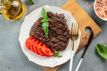 steak dinner. Juicy veal steak with spices. Barbecue. banner, menu, recipe place for text, top view