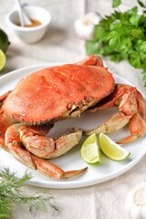 Boiled crab with lime , garlic and seasoning.