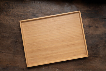 empty tray on wooden table