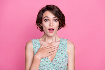 Portrait young girl impressed unbelievable hand heart shock surprised wear stylish print top open mouth isolated on pink color background